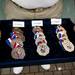 A staff member holds bronze, silver, and gold medals during an award ceremony on Monday, July 29. Daniel Brenner I AnnArbor.com